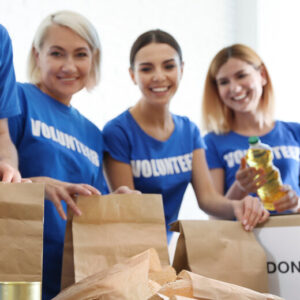 Volunteers packing food donations